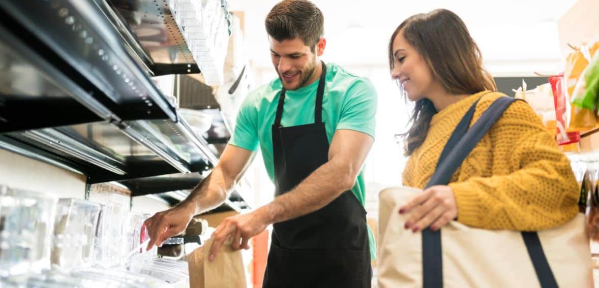 Retail employee helping customers